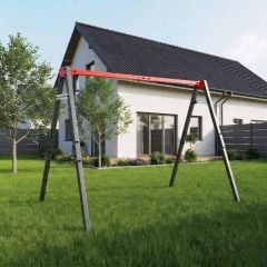 Structure de balançoire K-Sport en métal dans le jardin devant la maison sans sièges