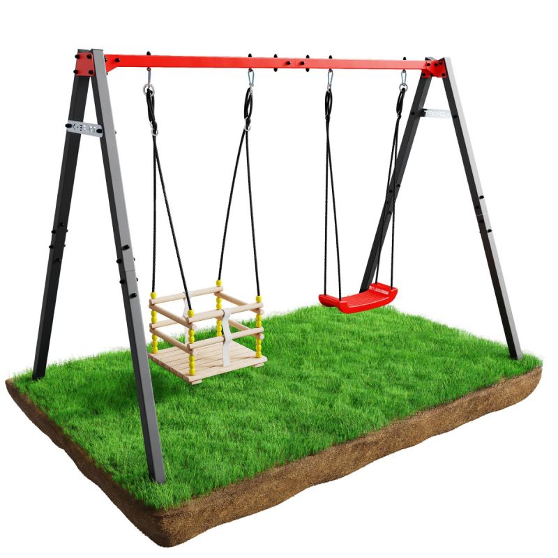 Columpio infantil con columpio de tablas y asiento de rejilla sobre hierba verde